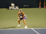 Concentrated Bianca Andrescu behind the base in a match against Alize Cornet of France, Wednesday, August 10, 2022