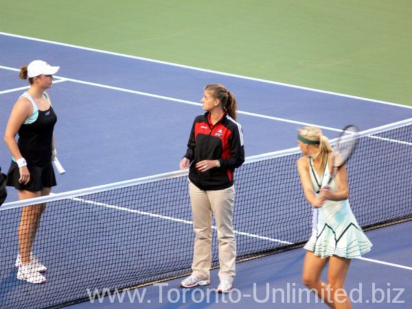 Alisa Kleybanova of Russia and Maria Sharapova of Russia. Coin toss for Semifinal match.