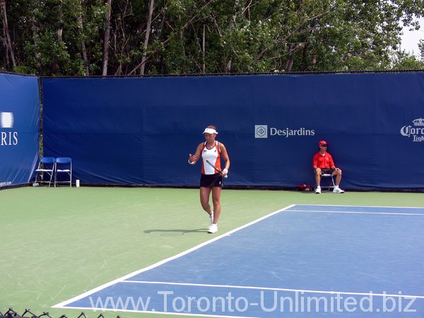 Ai Sugiyama of Japan, playing Iveta Benesova of Czech Republic.