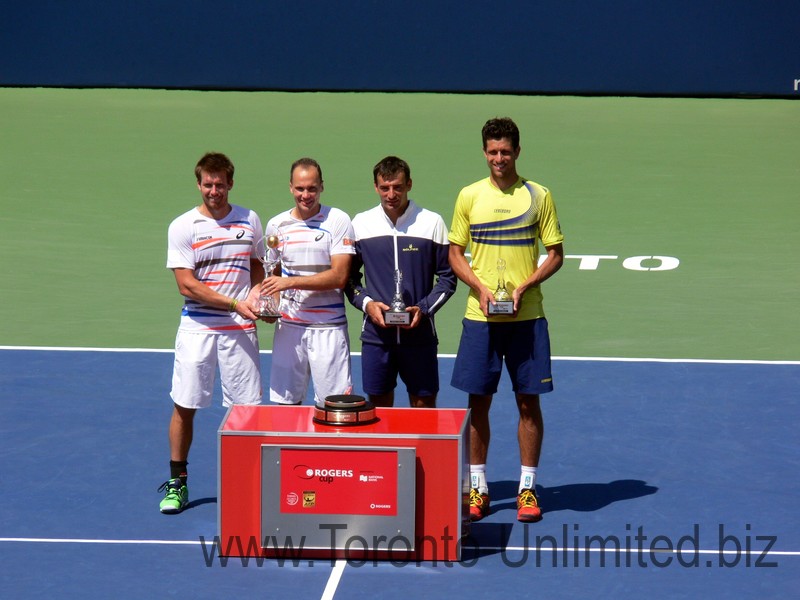 The winners Alexander Peya, Bruno Soares and runner-ups on the right, Marcelo Melo and with Ivan Dogic; all holding their Trophies August 10, 2014 Rogers Cup Toronto  