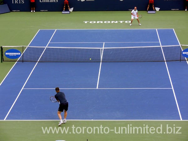 Jim Courier and Andre Agassi on Centre Court of Rexall Centre.
