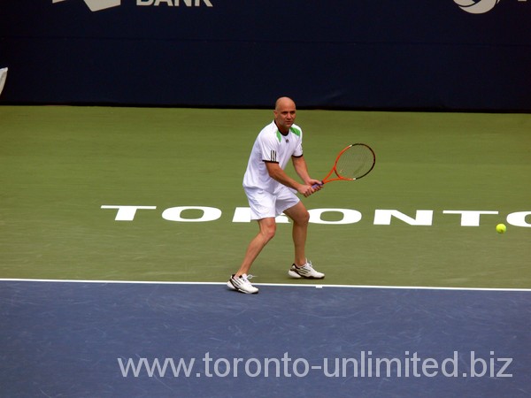 Andre Agassi with full concentration preparing to seturn serve