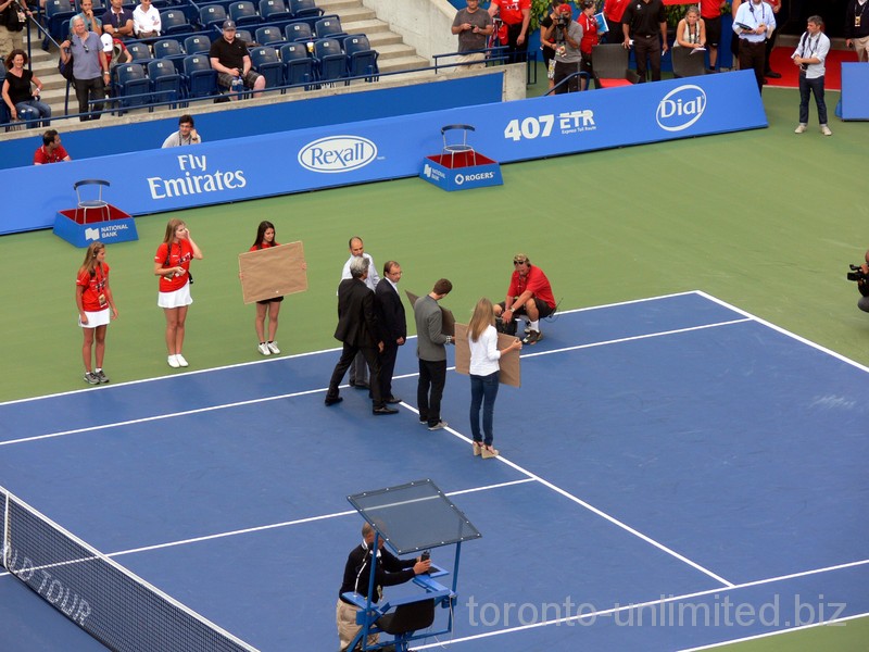 On the court ceremony to honour 2012 Wimbledon Juniors Champions Filip Peliwo and Eugene Bouchard. August 12, 2012 Rogers Cup.     