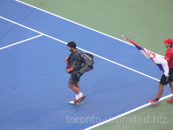 Janko Tipsarevic is walking up the Central Court, semifinal match, August 11, 2012 Rogers Cup.