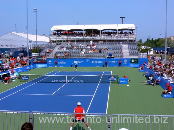Filip Peliwo is serving on Grandstand Stadium in qualifying match with Ivan Dodig  