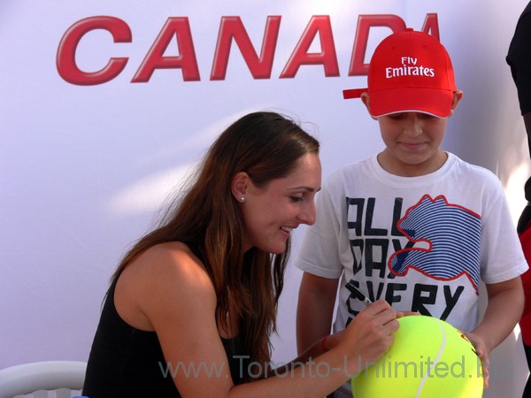 Eugenie Bouchard signing autographs to her fans at Tennis Canada Action Zone August 9, 2013 Rogers Cup Toronto
