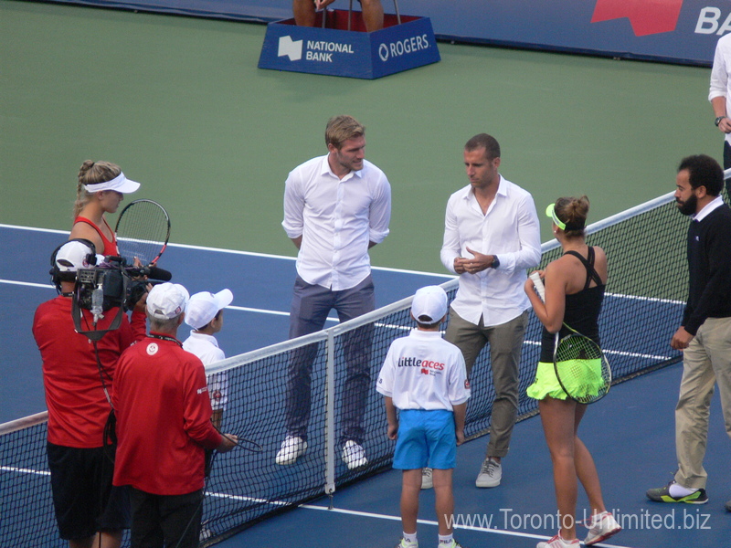 Eugenie Bouchard (CDN) and Belinda Bencic (SUI) standing on Centre Court before coin-toss 11 August 2015 Rogers Cup Toronto