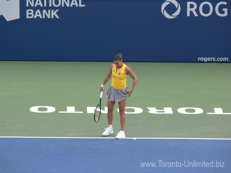 Flavia Pennetta serving on Centre Court in a match with Serena Williams 11 August 2015 Rogers Cup Toronto 