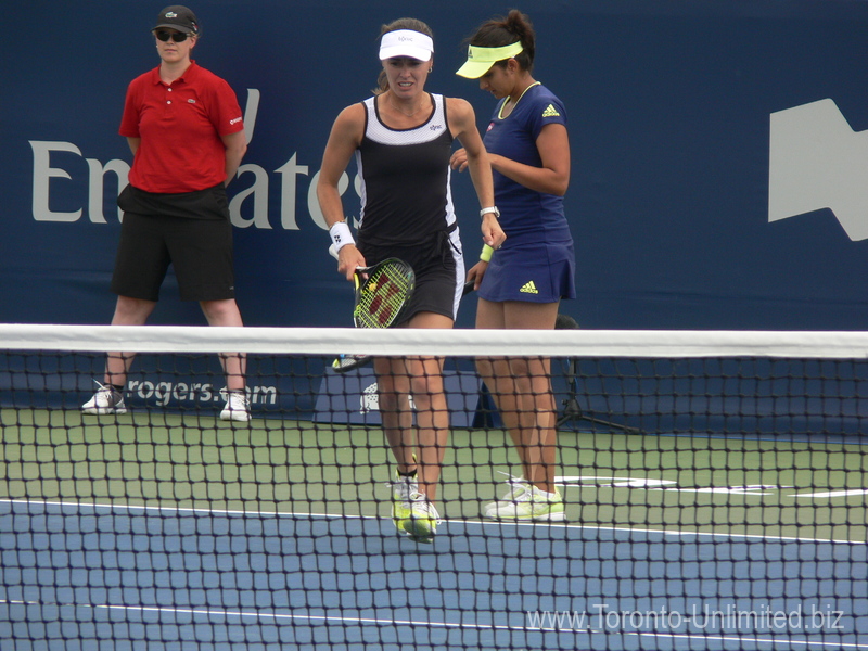 Martina Hingis in front with Sanja Mirza to serve 14 August 2015 Rogers Cup Toronto