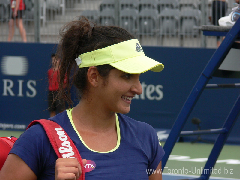 Sanja Mirza (IND) poses for photos after her doubles win 14 August 2015 Rogers Cup Toronto