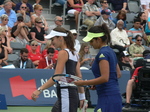 Martina Hingis (SUI) with her doubles partner Sanja Mirza (IND) on Grandstand Court playing H. Chan and Y. Chan (TPE) 14 August 2015 Rogers Cup Toronto