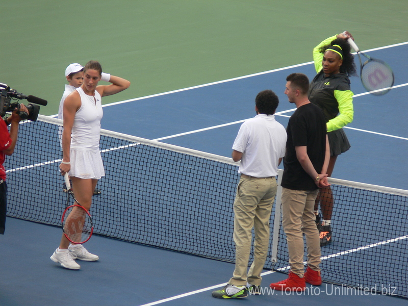 Serena Williams and Andrea Petkovic (GER) are ready for a coin-toss on Centre Court 13 August 2015 Rogers Cup Toronto