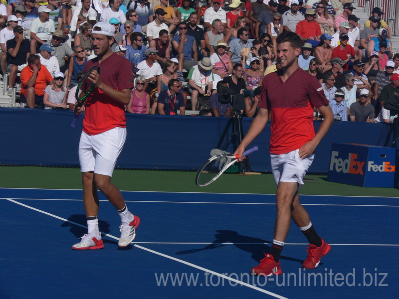 Lucas Poille (FRA) and Dominic Thiem (AUT) on Court 1 playing doubles match 25 July 2016 Rogers Cup Toronto 