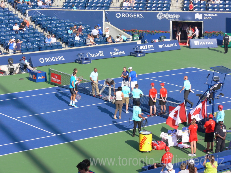 Coin-toss for doubles. Daniel Nestor and Vasek Pospisil on Central Court facing Jamie Murray and Bruno Soares (BRA) 30 July 2016 Rogers Cup Toronto