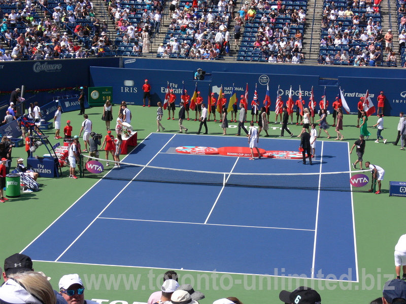 Elina Svitolina a Champion in postgame interview and the court in preparation for ceremony!
