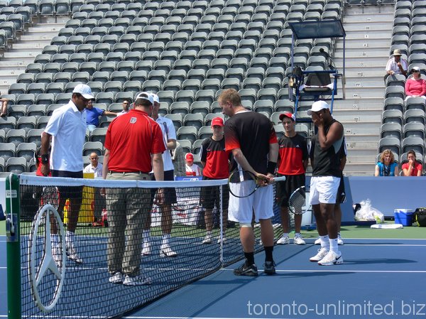 Dlouhy,  Paes, Bhuphathi, Knowles, coin toss. 