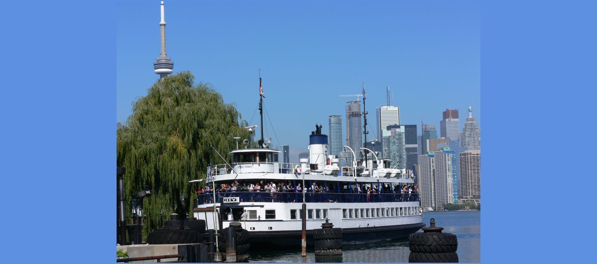 View from Toronto Island with Ferry and Toronto Downtown Panorama