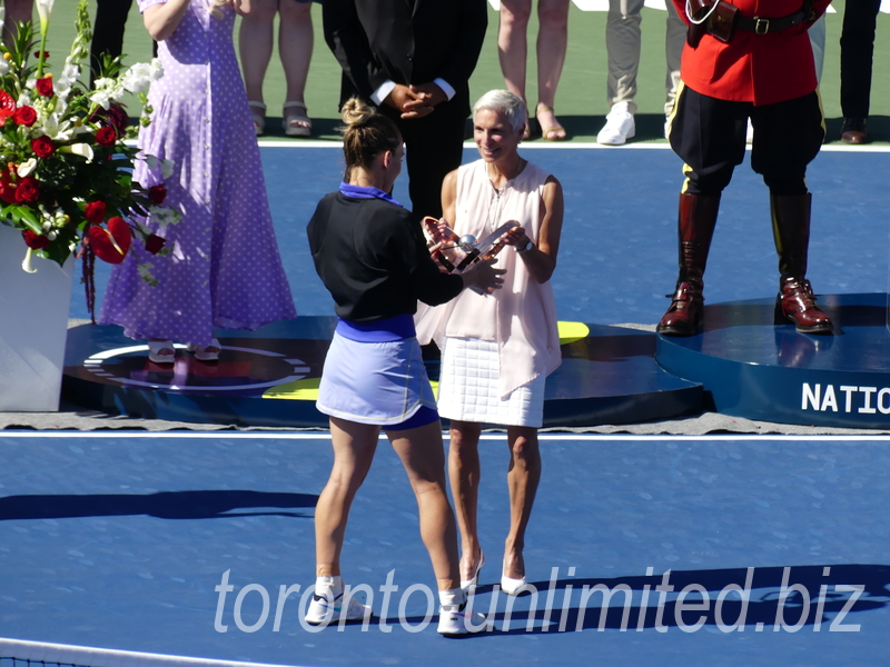 National Bank Open 2022 Toronto - Singles Final - Lucie Blanchet presents the Champion Trophy to the winner Simona Halep