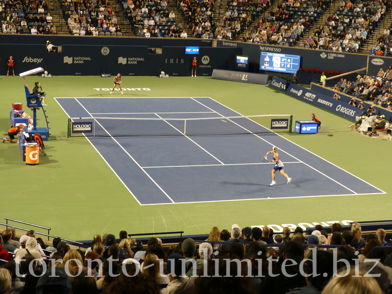 Bianca Andreescu is returning a backhand shot to Daria Kasatkina on Stadium Court Tuesday, August 9, 2022