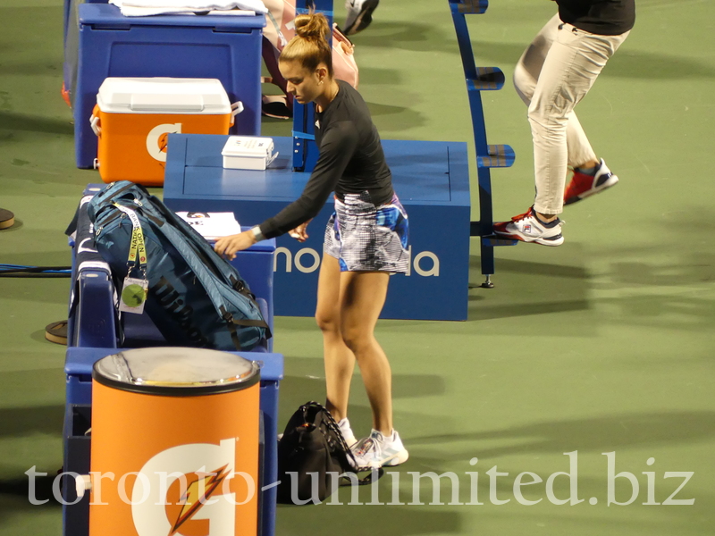 Maria SAKKARI GRE prepares for her warm-up while the umpire climbs to the chair. August 9, 2022