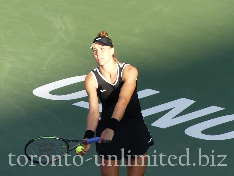 Beatriz HADDAD MAIA BRA serving in Semifinal match on Centre Court August 13, 2022, to Karolina Pliskova