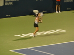 Daria Kasatkina with a nice expression on her face is preparing to return backhand standing on the sign of TORONTO Tuesday August 9, 2022