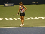 Daria Kasatkina is preparing to serve Bianca Andreescu on Stadium Court, standing on the sign TORONTO. August 9, 2022