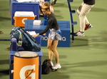 Maria SAKKARI GRE prepares for her warm-up while the umpire climbs to the chair. August 9, 2022