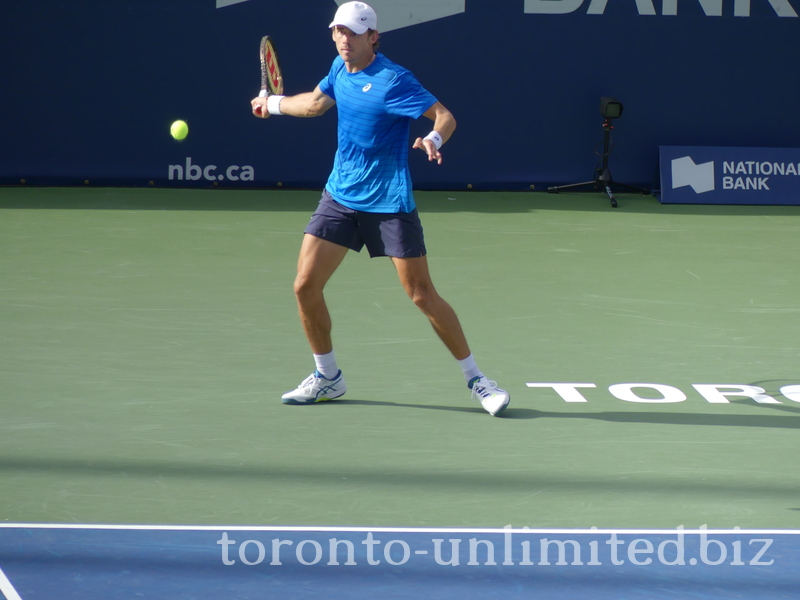 Alex De Minaur is about to return forehand to Jannik Sinner