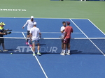 The Doubles Final Championship match is over, and competitors are shaking hands