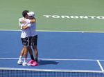 Doubles Final Champions Marcelo AREVALO (ESA) Jean-Julien ROJER (NED) embrace each other