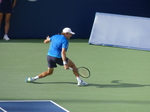 Intense tennis pose of Alex De Minaur on Centre Court