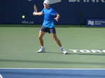 Alex De Minaur is about to return forehand to Jannik Sinner