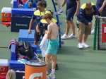 Jannik Sinner is changing his sweaty shirt before the Closing Ceremony presentation on August 13