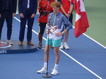 Jannik Sinner is holding Championship Trophy and speaking