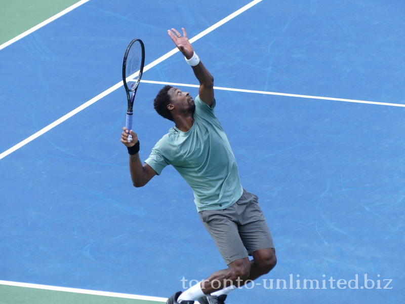 Gael Monfils (FRA) is serving to Stefanos Tsitsipas (GRE) on Centre Court 