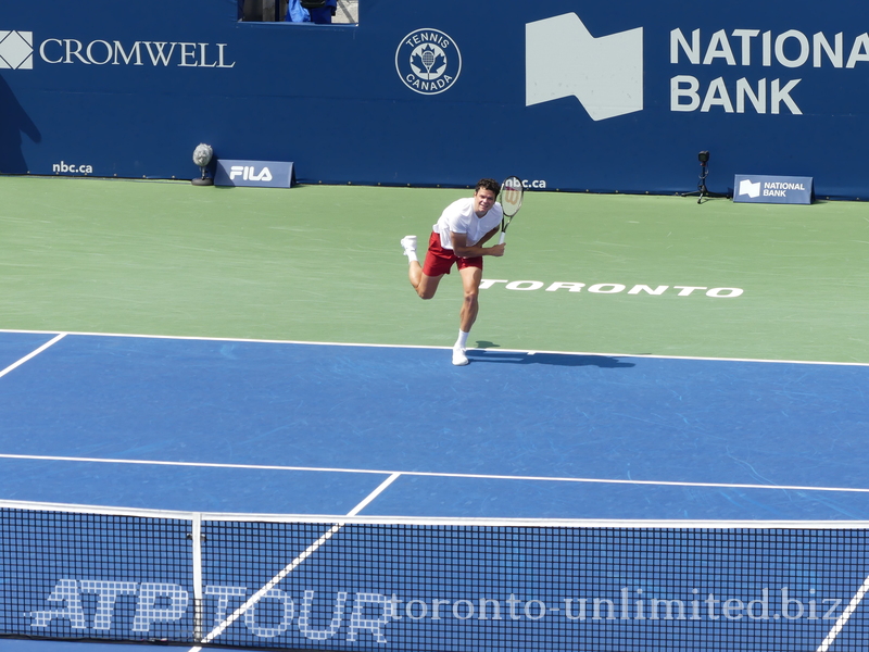 Milos Raonic (CAN) has just served on Centre Court to Mackenzie McDonald 