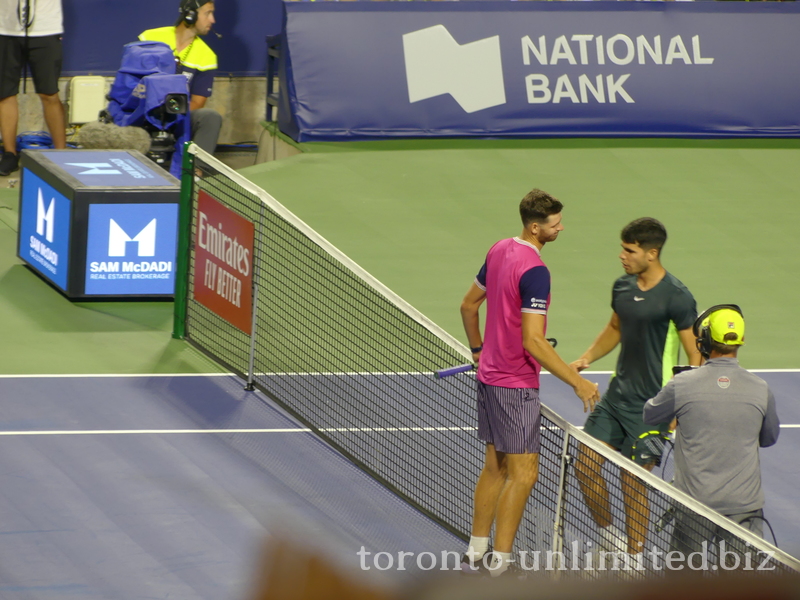 The match is over, and the winner, Carlos ALCARAZ (ESP) [1], shakes hands with Hubert HURKACZ (POL) [15]  