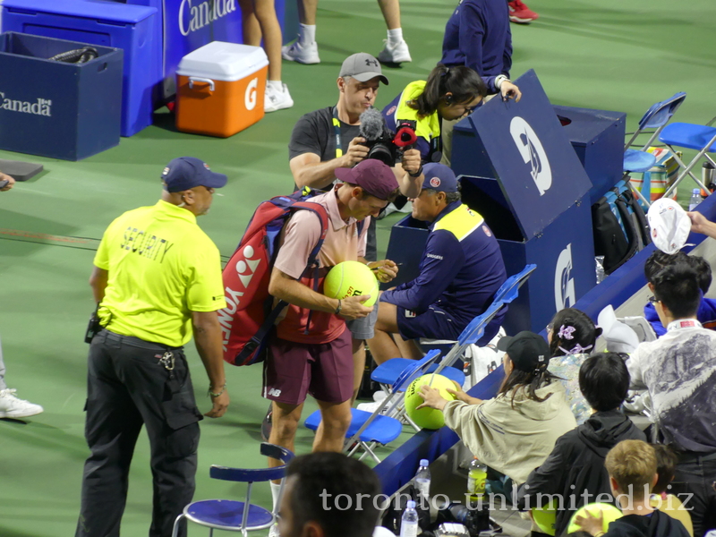 Tommy PAUL (USA) signing the ball for a fan 11 August 2023 National Bank Open