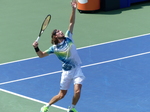 Stefanos Tsitsipas serving on Centre Court