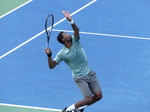 Gael Monfils (FRA) is serving to Stefanos Tsitsipas (GRE) on Centre Court 