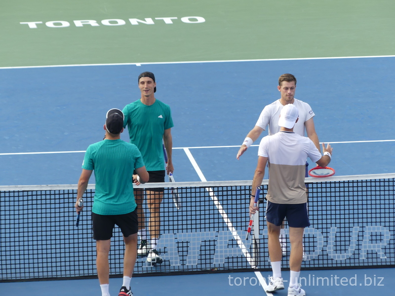The Championship Doubles Final is over, and the competitors are shaking hands.  NBO 2025 in Toronto, August 7, 2025 