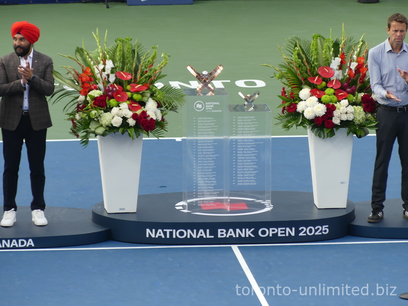 National Bank Open 2025 Championship and Runner-up Trophy on display
