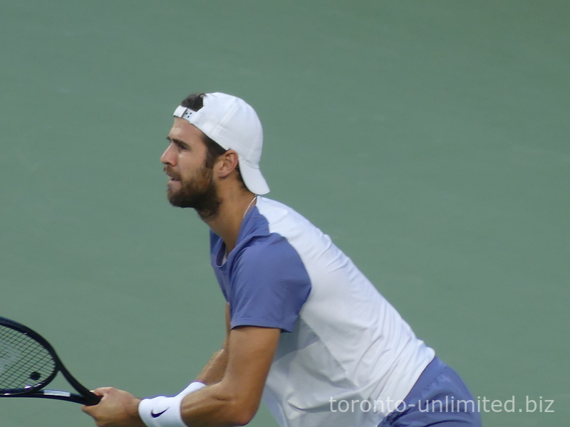 Close-up of Karen Khachanov expecting the serve from Ben Shelton