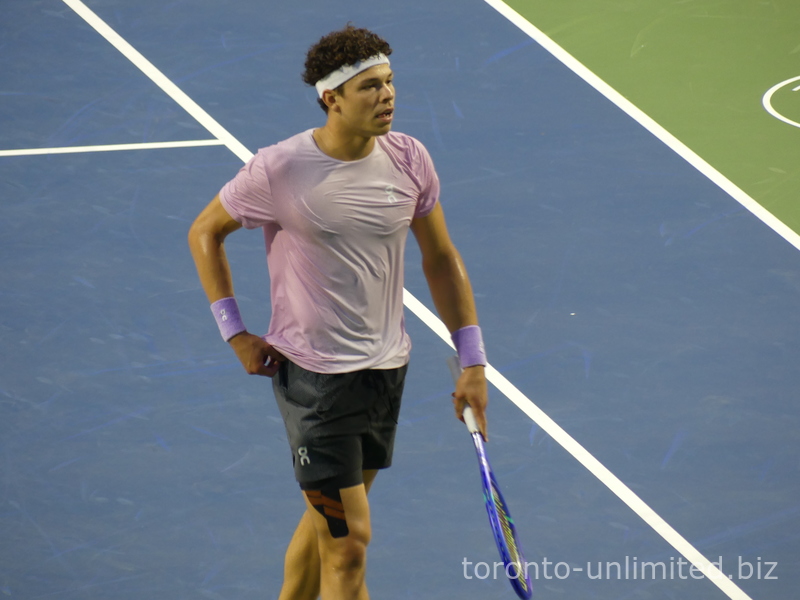 Real sweat is visible on Ben Shelton, and his leg is taped with the black K-tape. The NBO 2025 Toronto is a Championship Final 