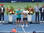 Champions Julian Cash and Lloyd Glasspool are posing for pictures during the Championship Closing Ceremony. NBO 2025 Toronto August 7, 2025