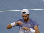 Close-up of Karen Khachanov with the water bottle  at the start of the Championship game NBO 2025, August 7, 2025