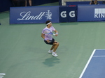 Ben Shelton is playing a one-handed backhand to Karen Khachanov with nicely bent knees.