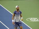 Karen Khachanov walking the Court in a sweaty shirt in the NBO 2025 Championship Final, August 7, 2025 