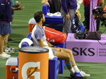 Karen Khachanov is sitting, resting and awaiting his turn in the Closing Ceremony. 